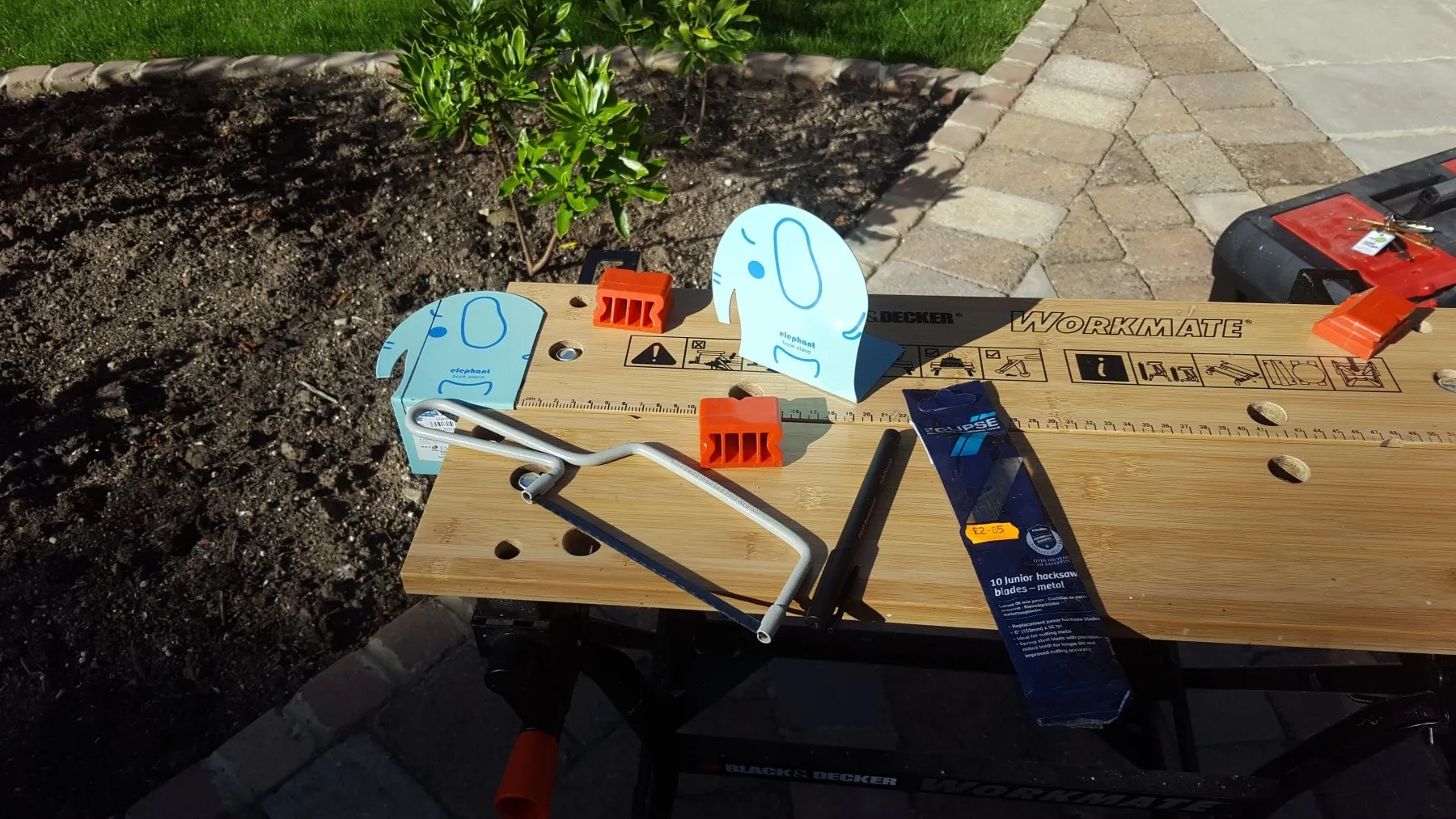 Cutting steel bookends for the battery holder